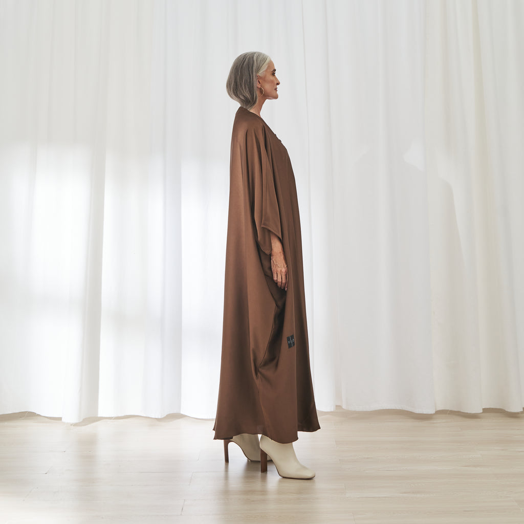 Hilal dress in Rust by FILO, side view