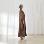 Hilal dress in Rust by FILO, side view