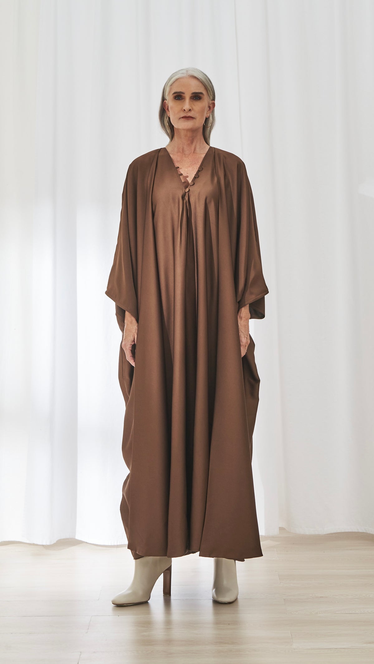 Hilal dress in Rust by FILO, front view