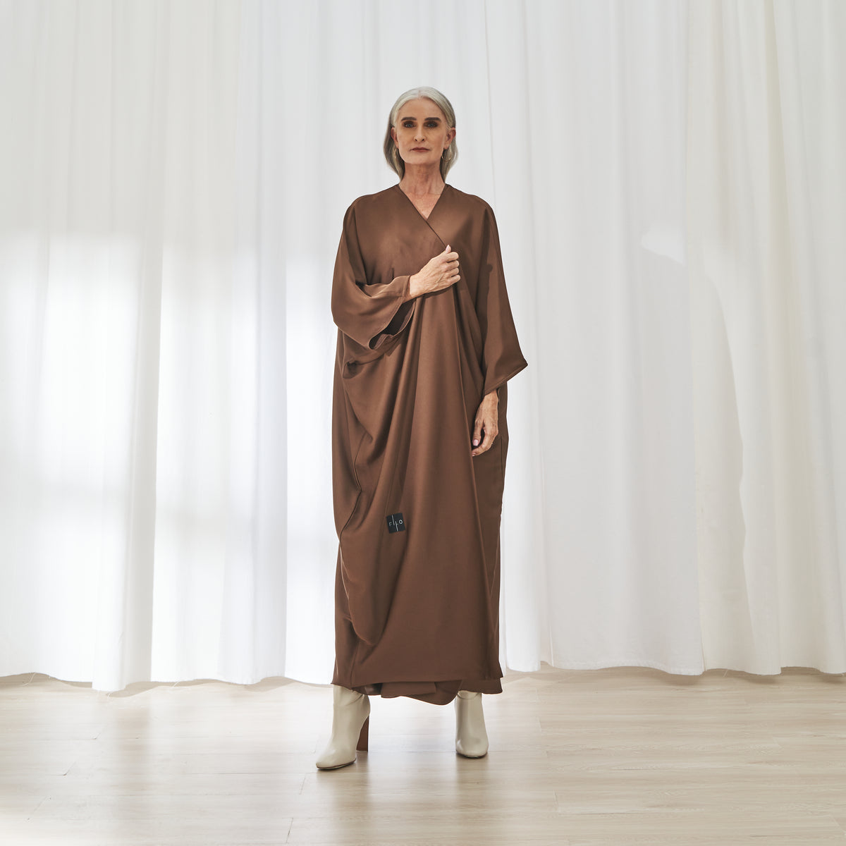 Hilal dress in Rust by FILO, front view